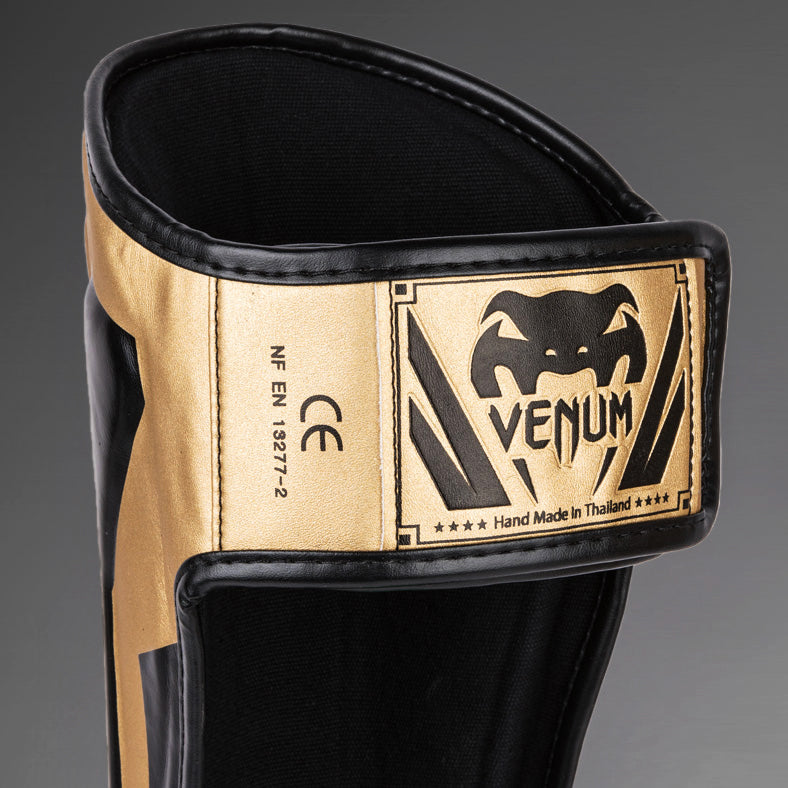Venum Elite Scheenbeschermers - Goud/Zwart