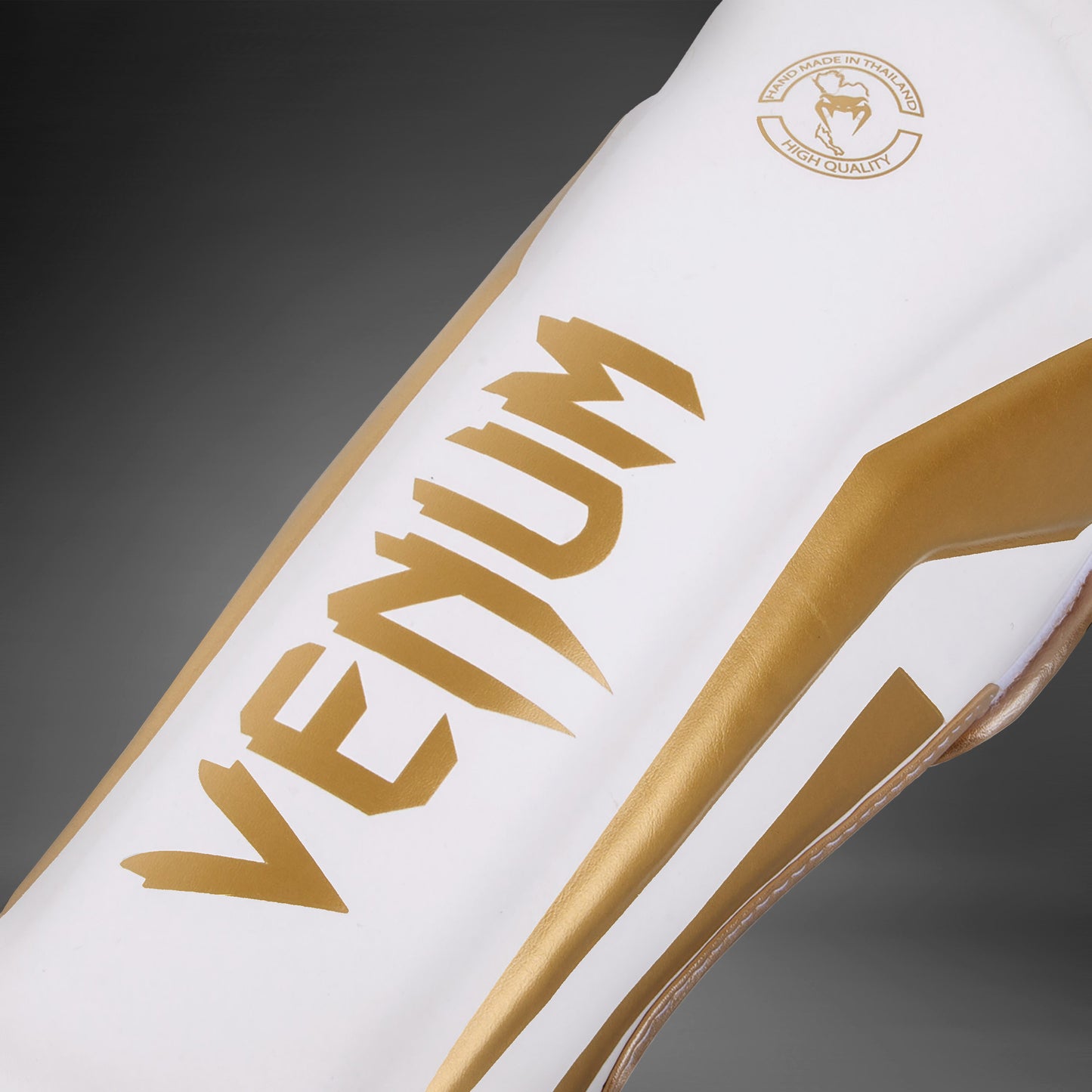 Venum Elite Standup Scheenbeschermers - wit/goud