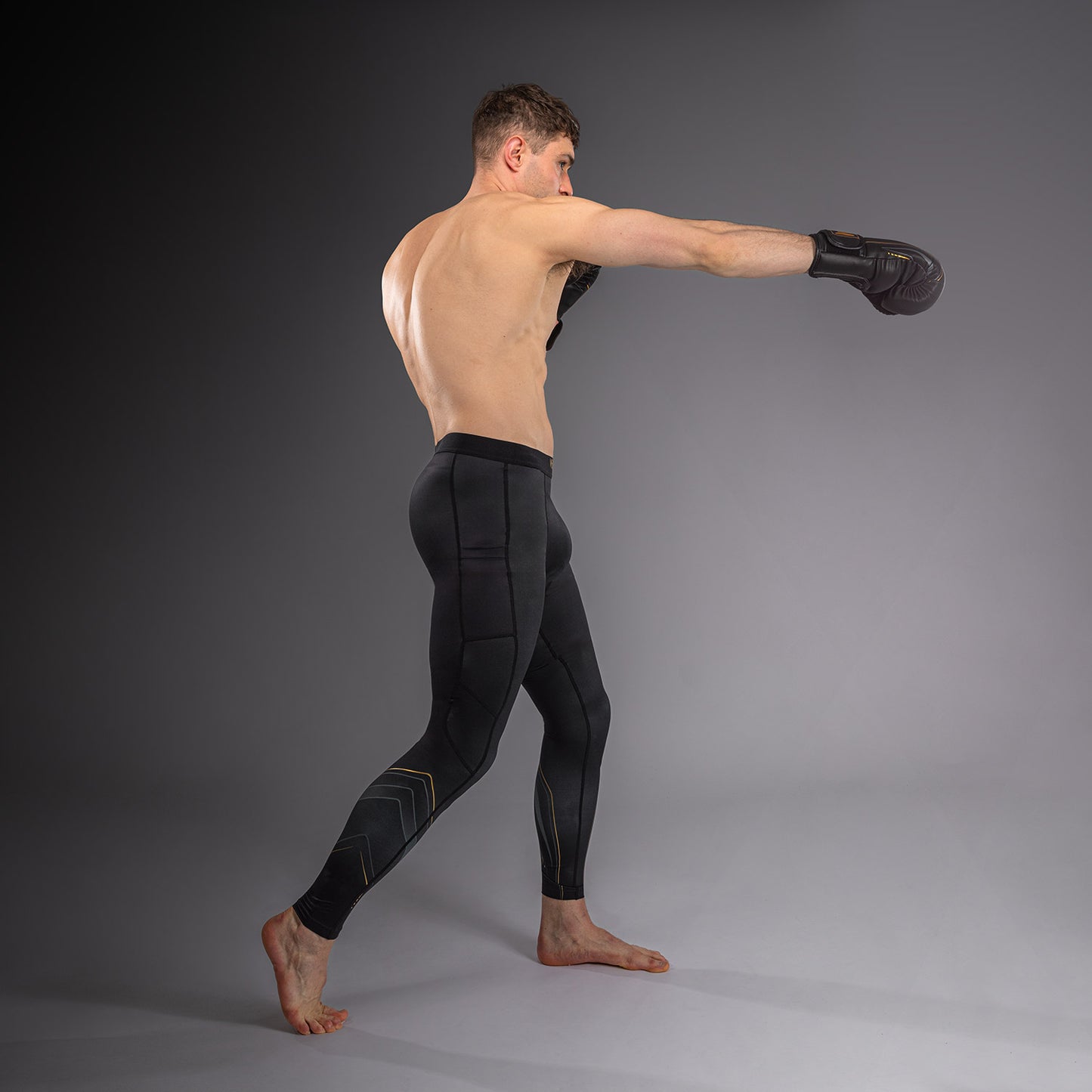 Venum Streamline Spats – Zwart/Goud