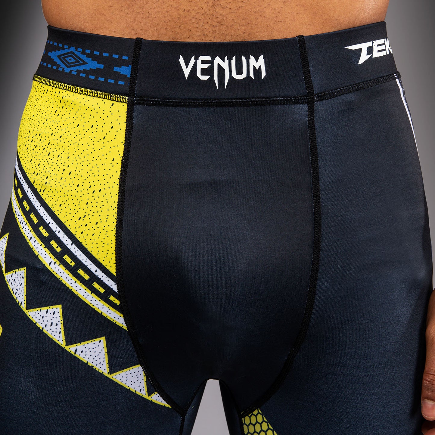 Venum x TEKKEN 8 Spats - King - Zwart/Geel