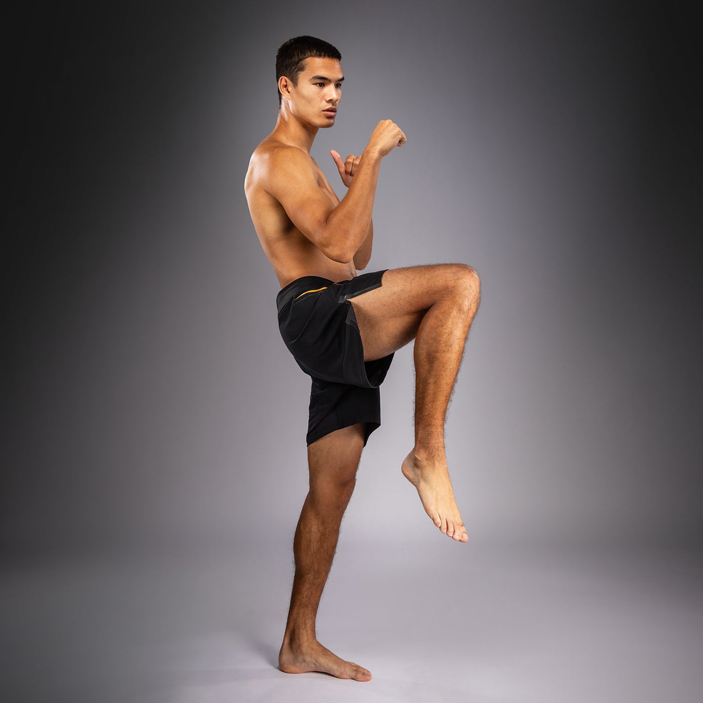 Venum G-Core Fightshorts - Zwart/Goud