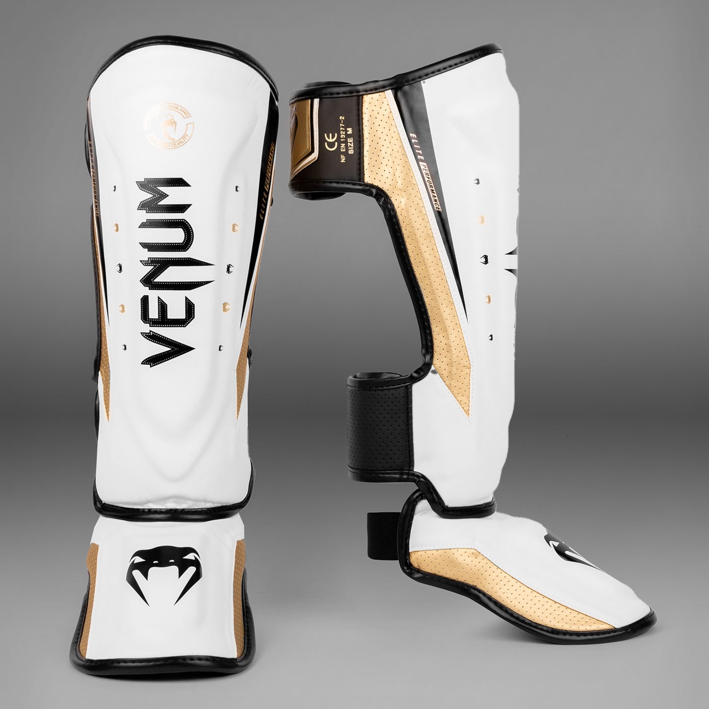 Venum Elite Evo scheenbeschermers - Wit/Goud
