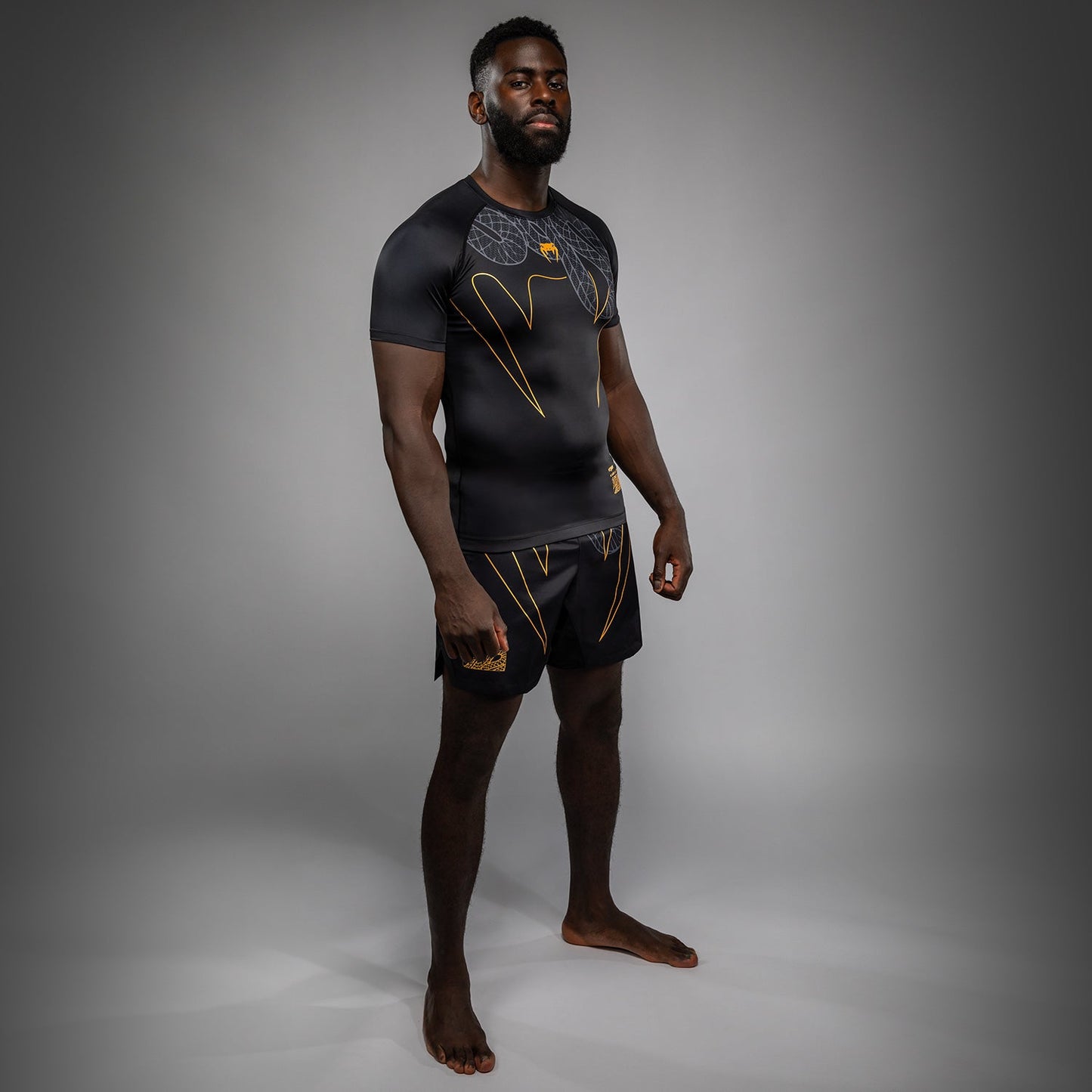 Venum Serpenti Rashguard met korte mouwen – Zwart/Zilver/Goud