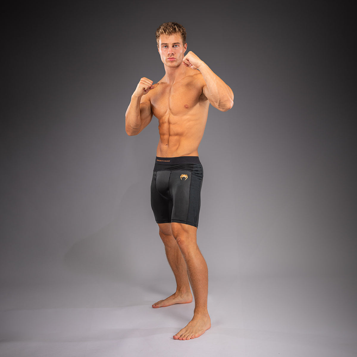 Venum G-Fit Revolution Vale Tudo-short - Zwart/Koper