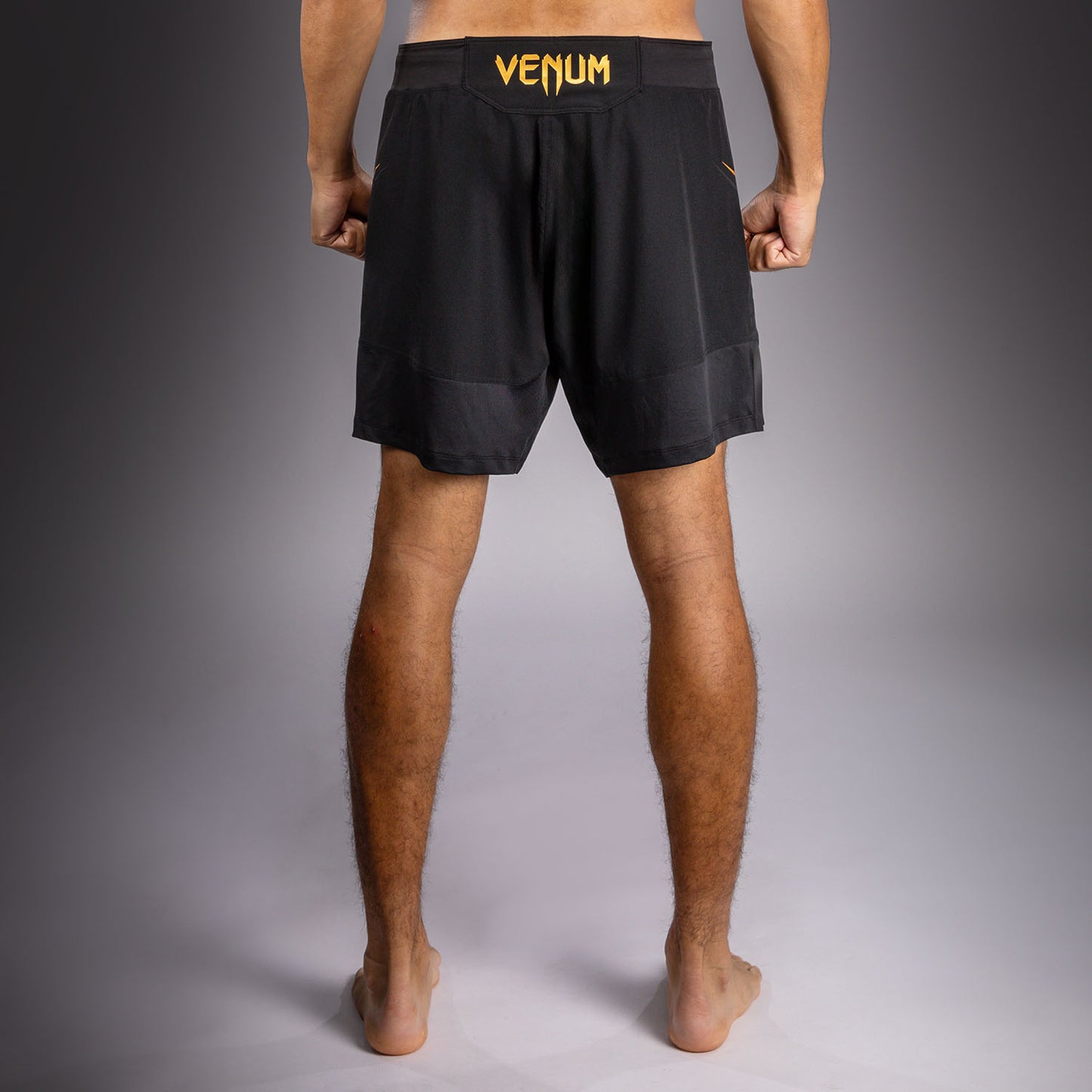 Venum G-Core Fightshorts - Zwart/Goud