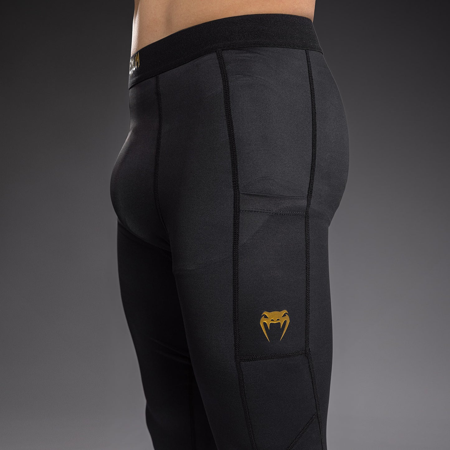Venum Streamline Spats – Zwart/Goud