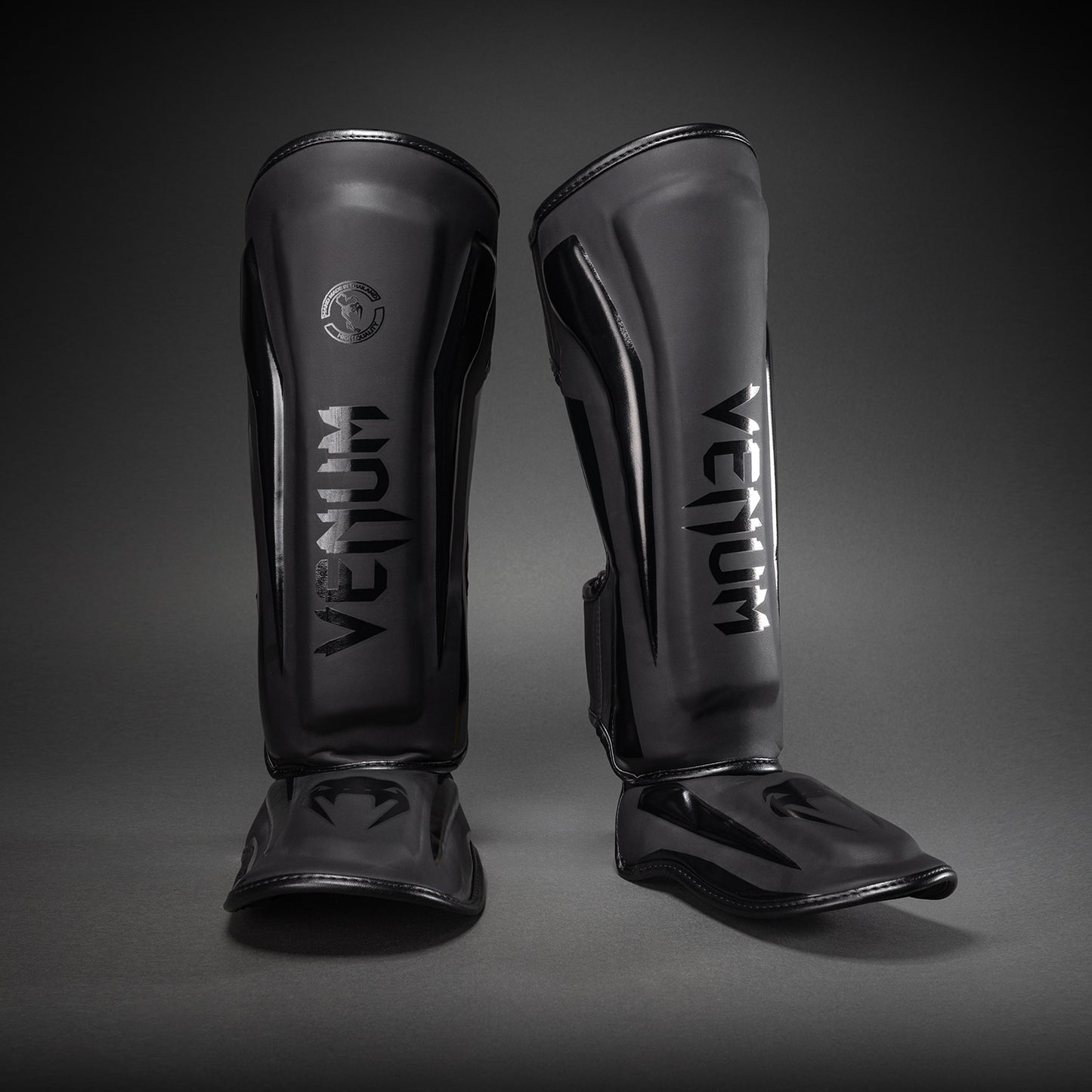 Venum Elite Standup Scheenbeschermers - mat/zwart