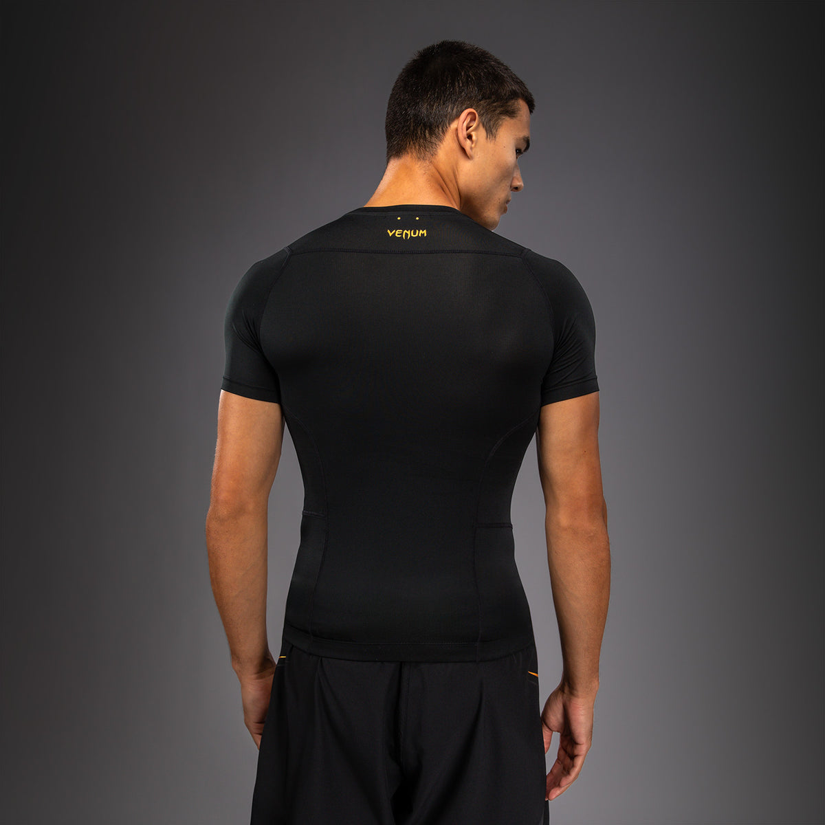 Venum G-Core Met korte mouwen Rashguard - Zwart/Goud