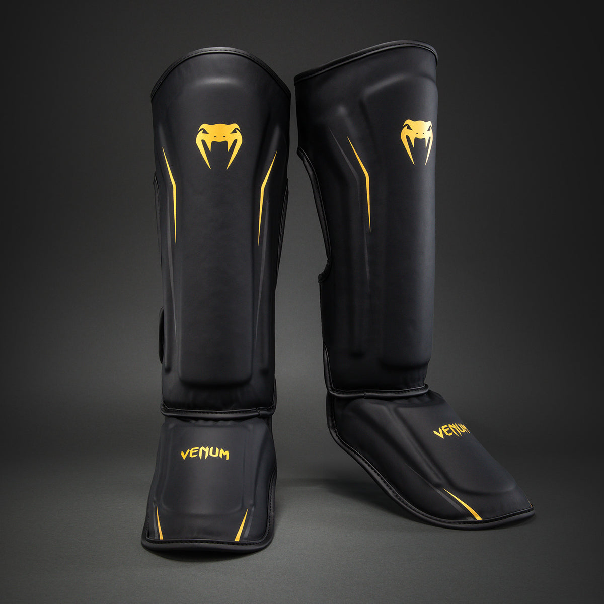 Venum G-Core Scheenbeschermers - Zwart/Goud