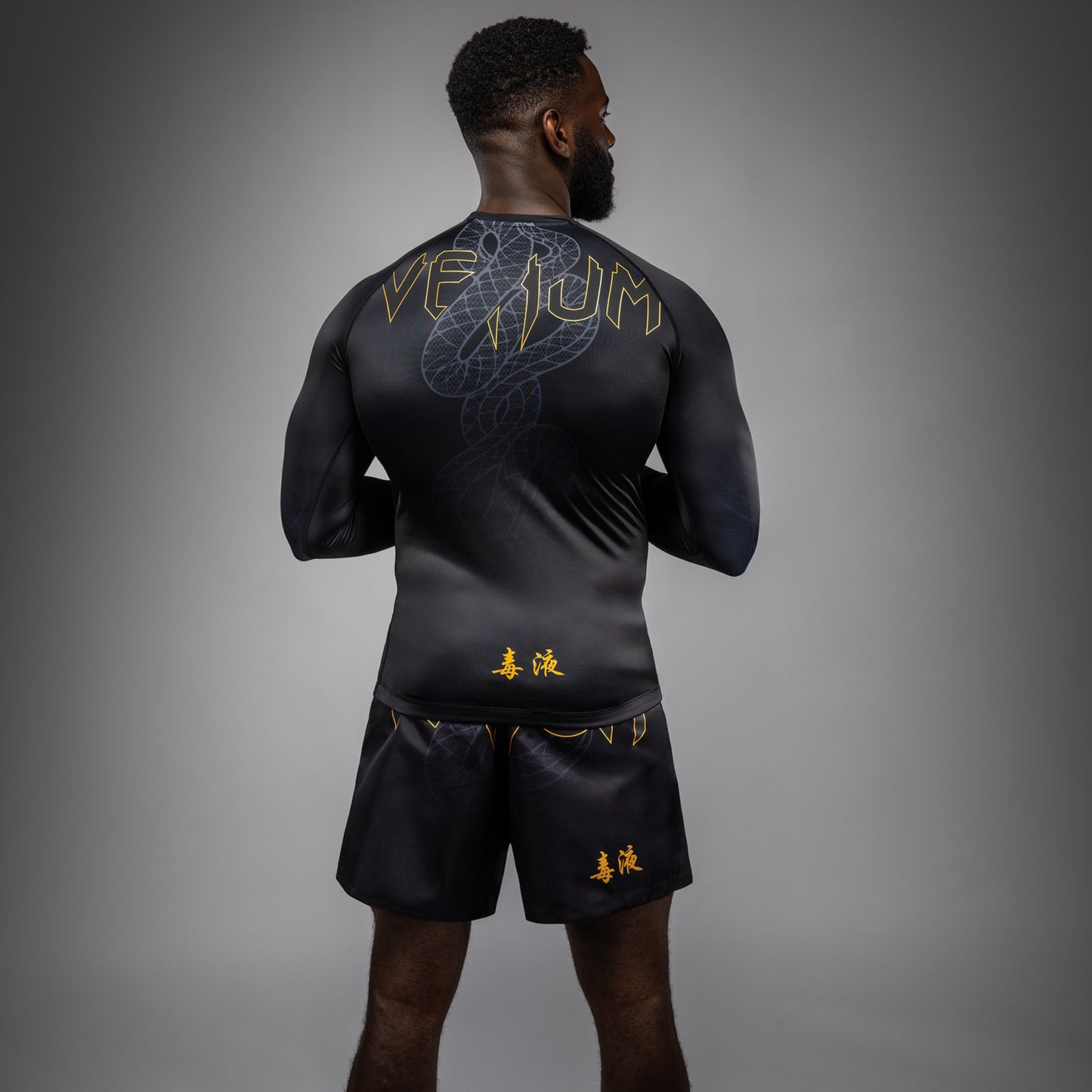 Venum Serpenti Rashguard met lange mouwen – Zwart/Zilver/Goud