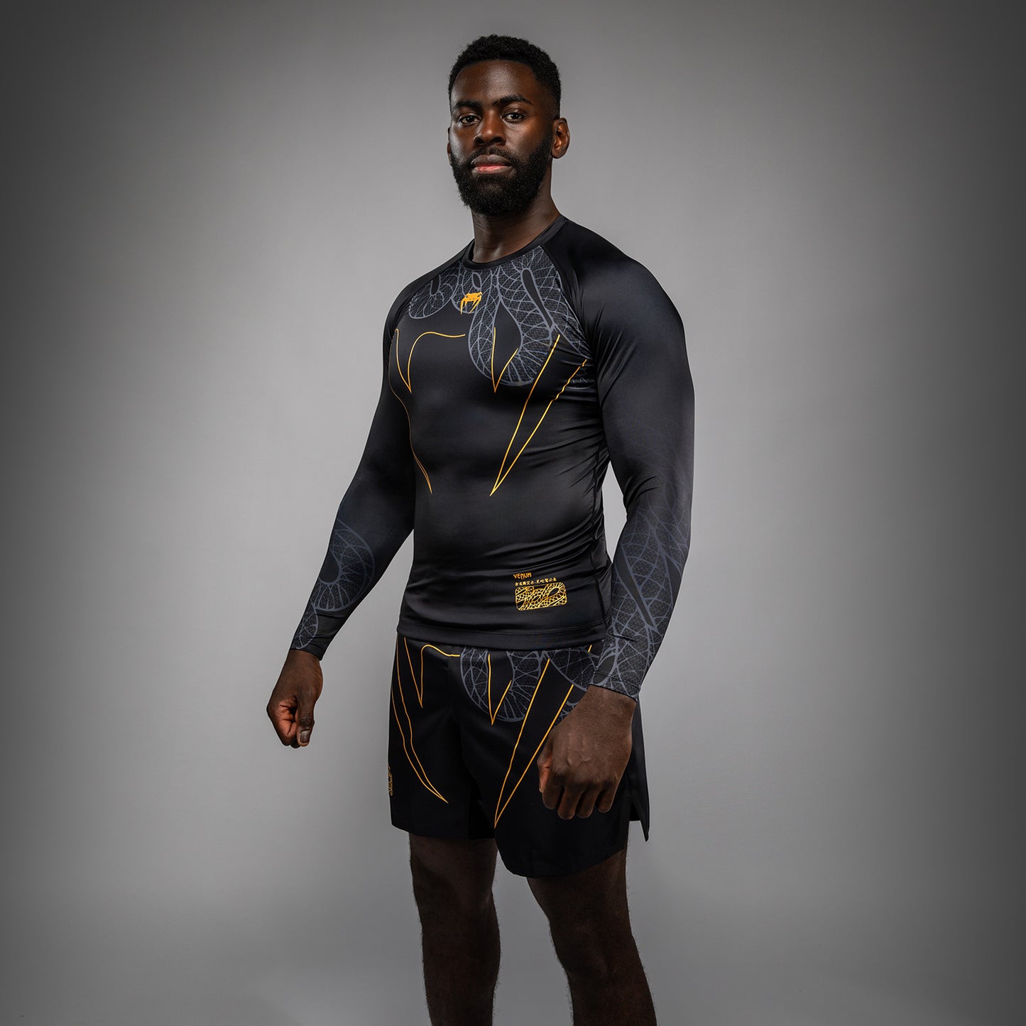 Venum Serpenti Rashguard met lange mouwen – Zwart/Zilver/Goud