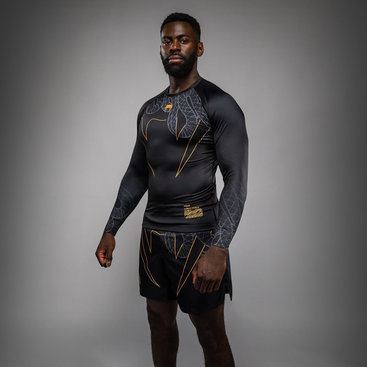 Venum Serpenti Rashguard met lange mouwen – Zwart/Zilver/Goud
