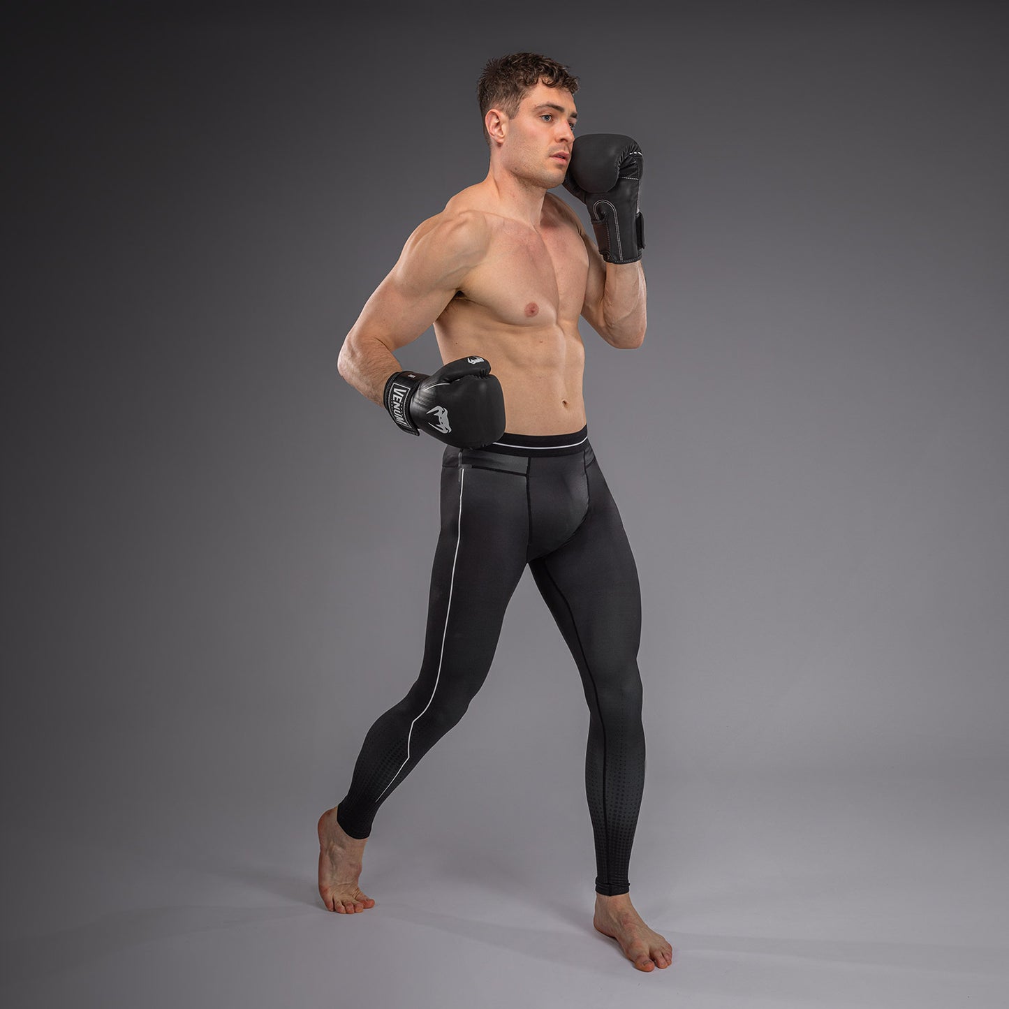 Venum Stealth Spats – Zwart/Wit