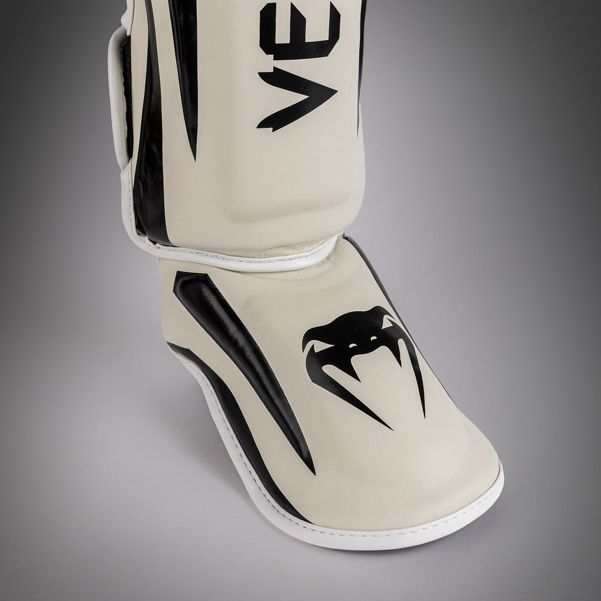 Venum Elite scheenbeschermers - Wit/Zwart