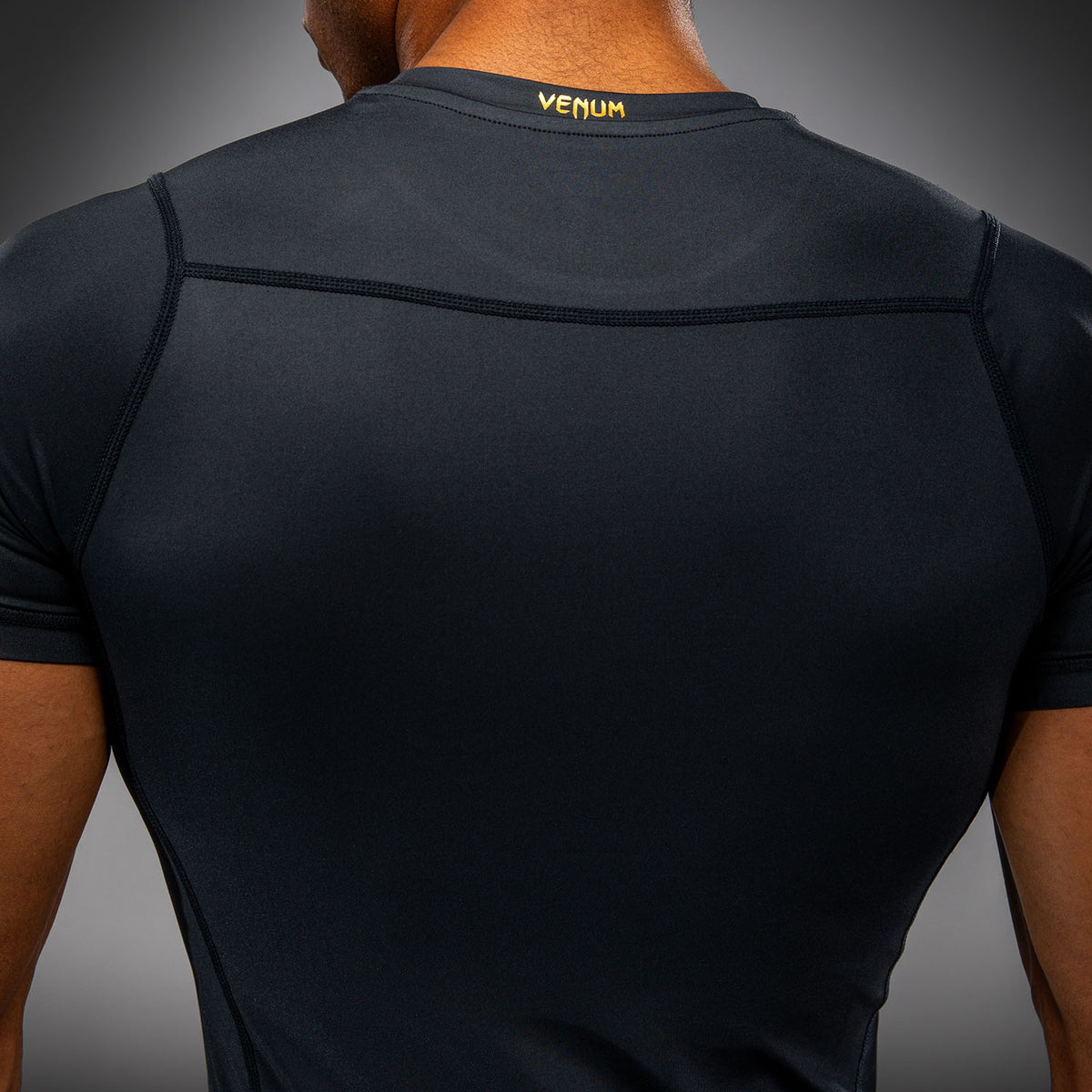 Venum Attack Rashguard met korte mouwen - Zwart/Goud