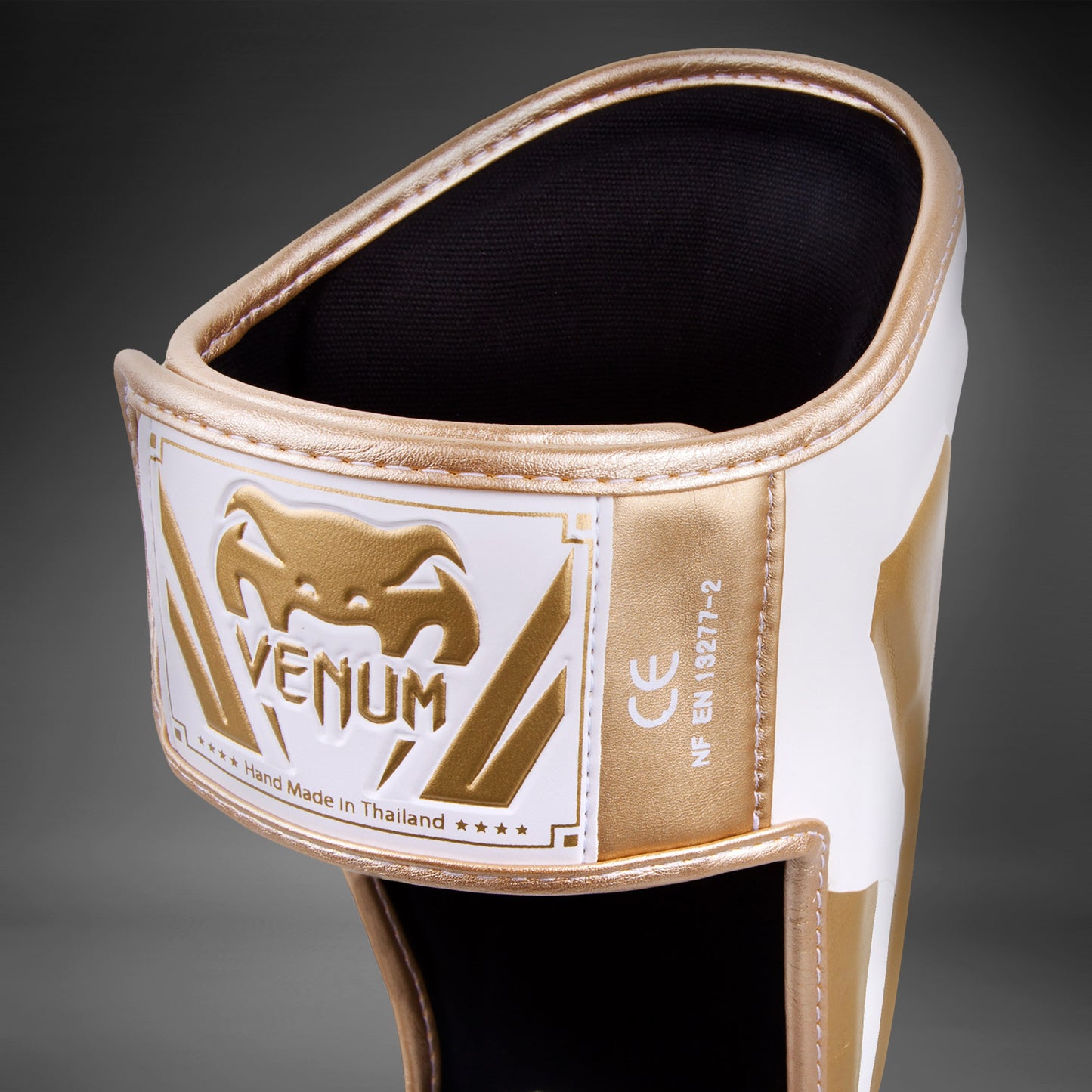 Venum Elite Standup Scheenbeschermers - wit/goud
