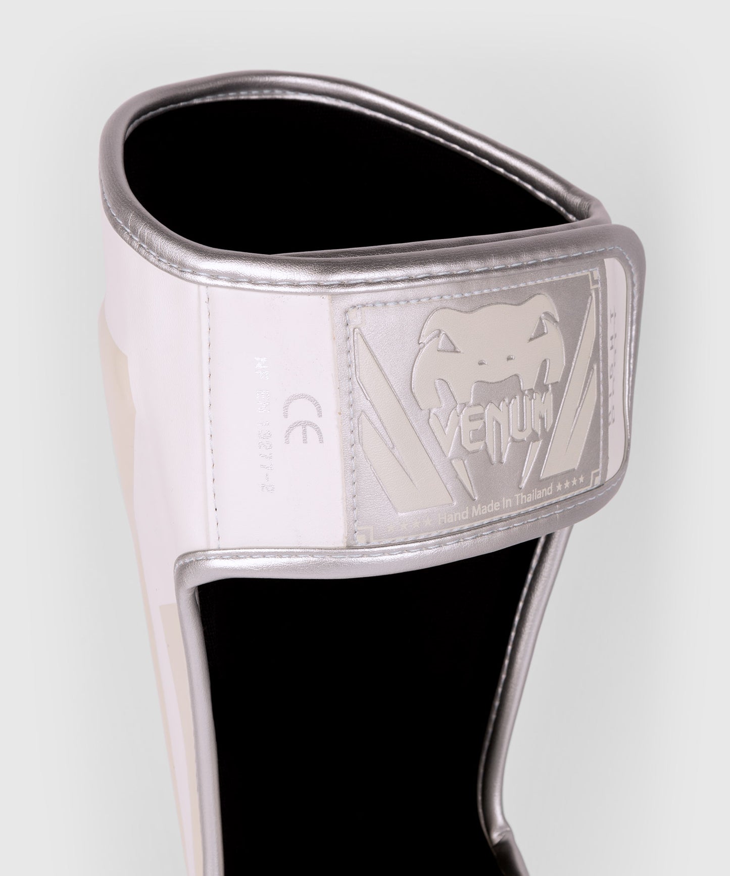 Venum Elite scheenbeschermers - Wit/zilver-roze